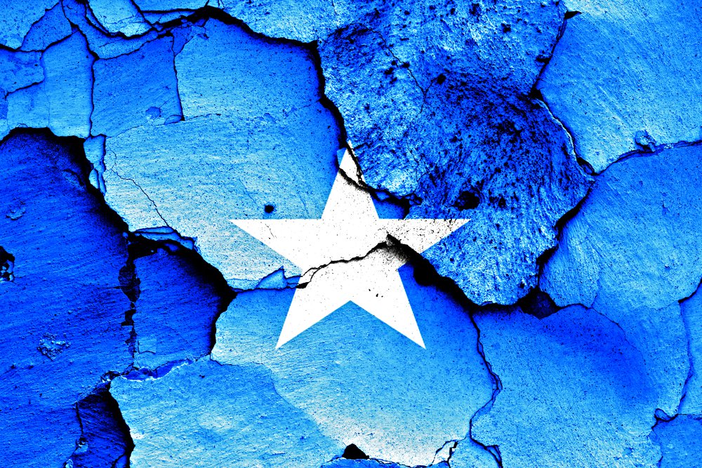 flag of Somalia painted on cracked wall