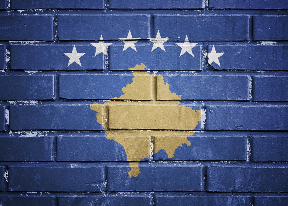 Kosovo flag on the brick wall 